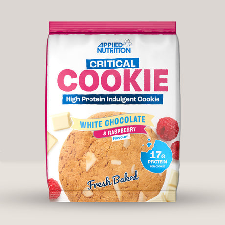 Imagine cu un biscuit proteic Critical Cookie 73g de la APPLIED NUTRITION, o gustare delicioasă și sănătoasă cu conținut ridicat de proteine cu aromă de ciocolată albă.