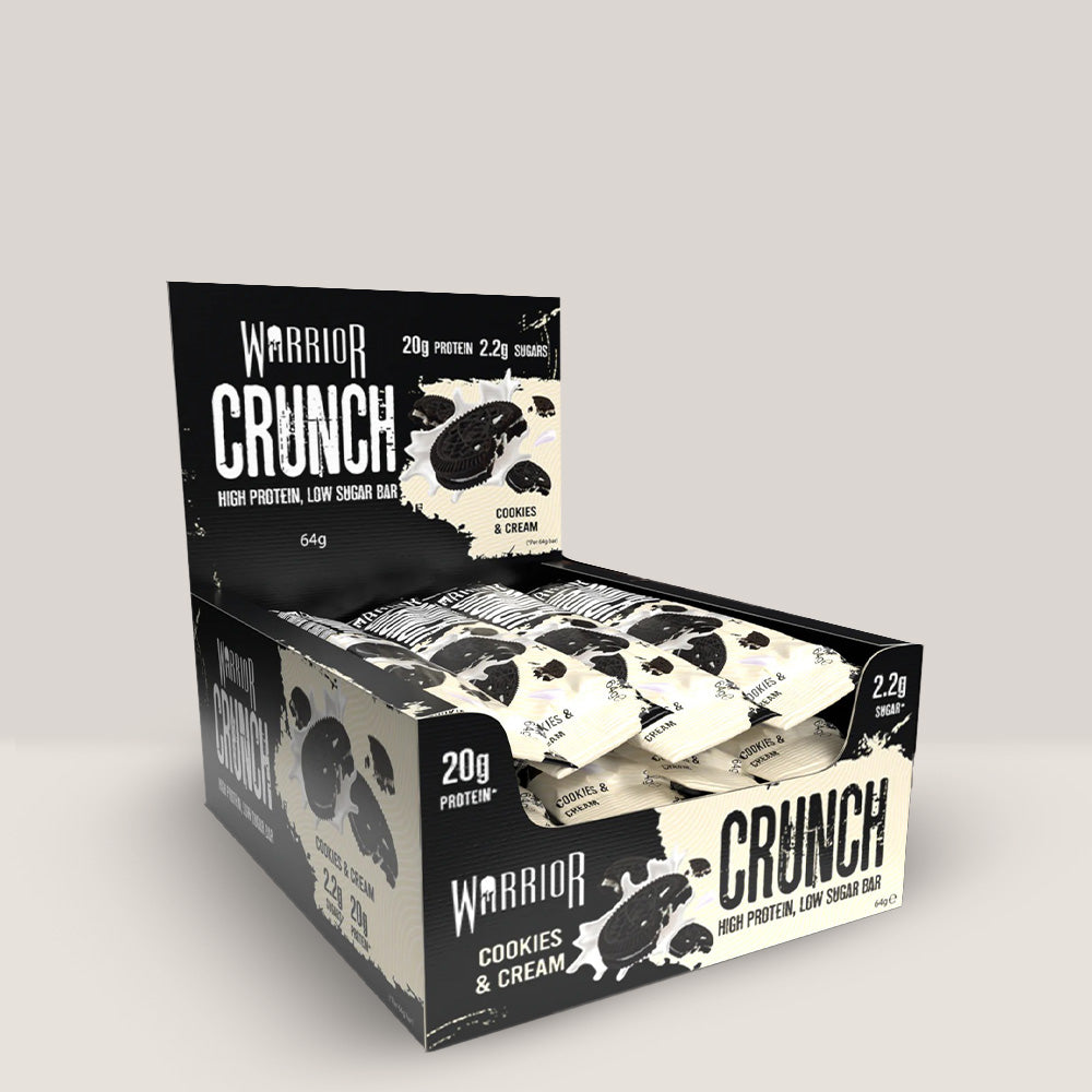 Imagine cu batonul proteic Warrior Crunch Bar de la WARRIOR, 64g. Cookies cream aroma.