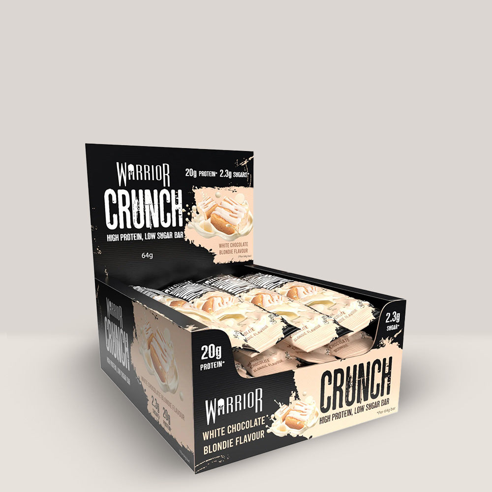 Imagine cu batonul proteic Warrior Crunch Bar de la WARRIOR, 64g. White chocolate, blondie aroma.