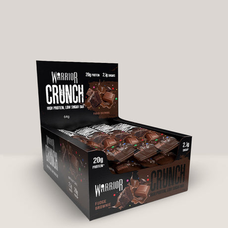 Imagine cu batonul proteic Warrior Crunch Bar de la WARRIOR, 64g. Fudge brownie aroma.