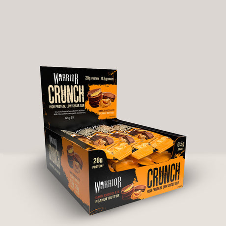 Imagine cu batonul proteic Warrior Crunch Bar de la WARRIOR, 64g. Dark chocolate peanut butter.