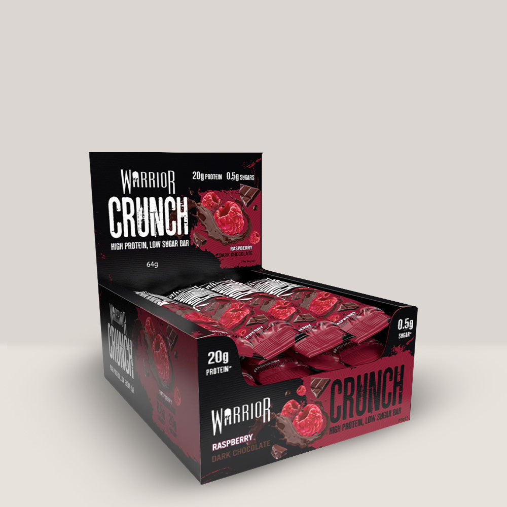 Imagine cu batonul proteic Warrior Crunch Bar de la WARRIOR, 64g. Raspberry, dark chocolate aroma.