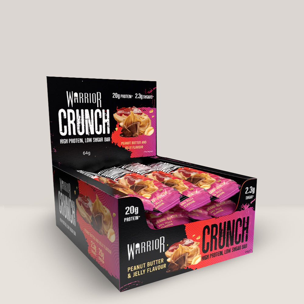 Imagine cu batonul proteic Warrior Crunch Bar de la WARRIOR, 64g. Peanut butter jelly aroma.