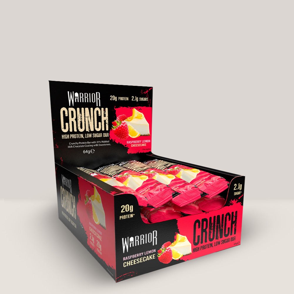 Imagine cu batonul proteic Warrior Crunch Bar de la WARRIOR, 64g. Raspberry lemon cheesecake aroma.
