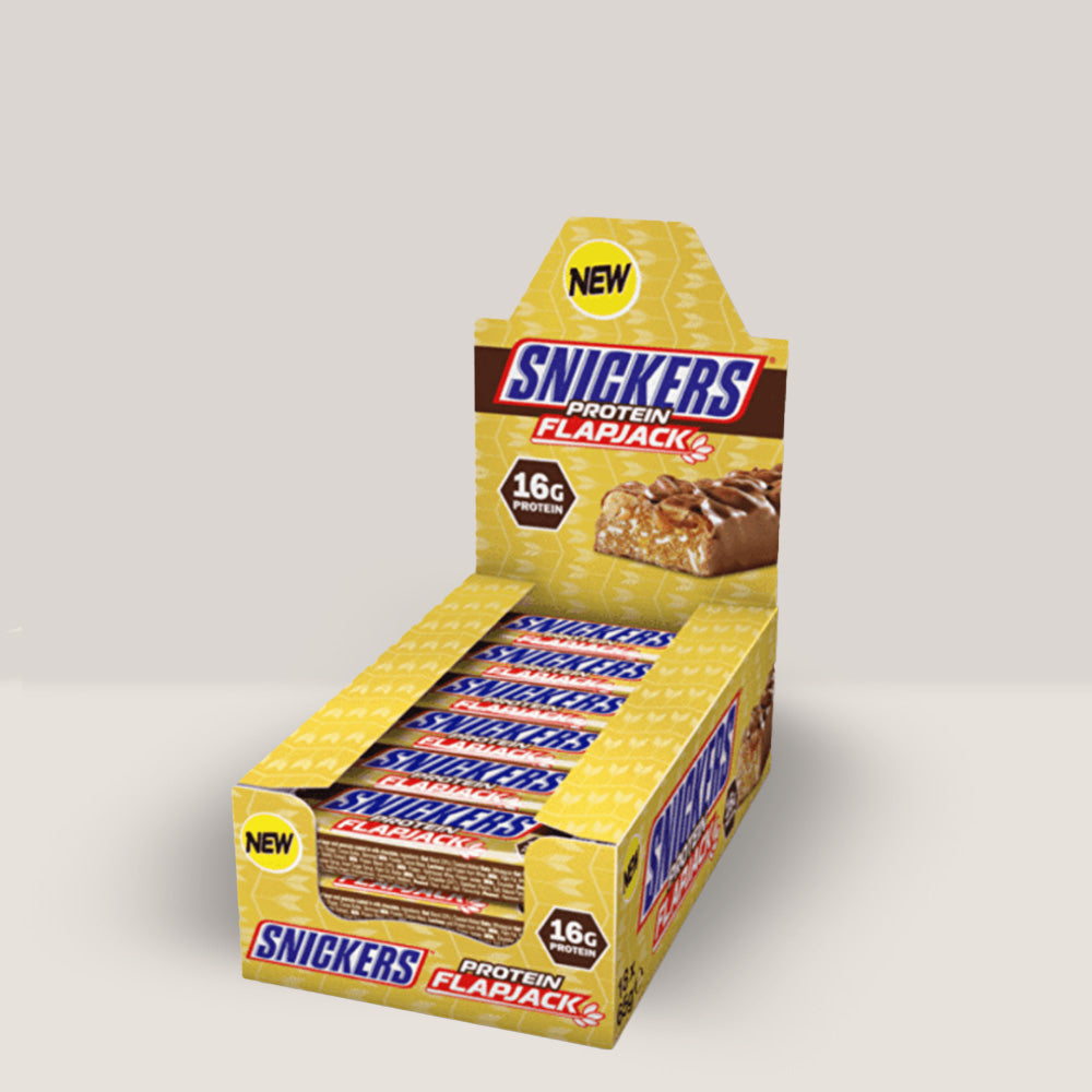 Batoane proteice flapjack Snickers Hi-Protein cu aromă de ciocolată, caramel și arahide. x18.