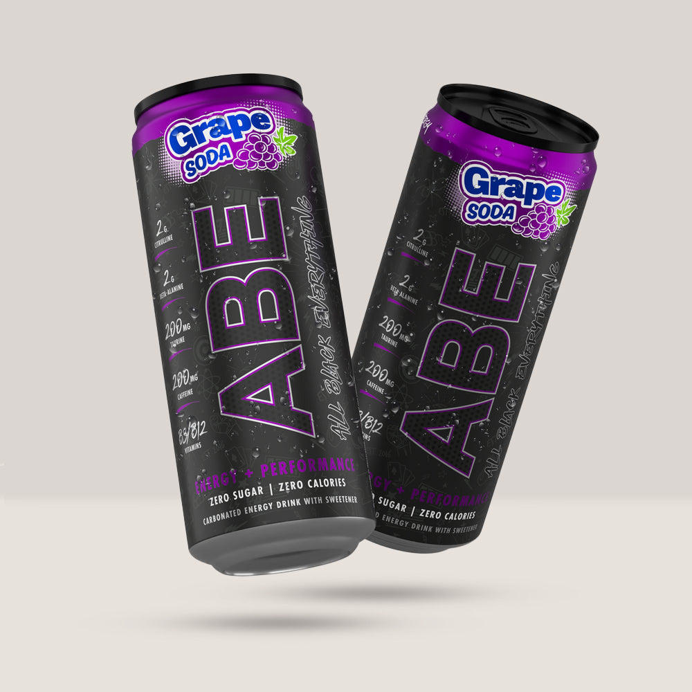 Imagine cu o cutie de 12 doze de ABE Energy Drink 330ml de la Applied Nutrition, o băutură energizantă carbogazoasă cu zero zahăr cu aromă de struguri.
