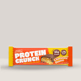 Imagine cu o bară proteică Crunch Protein Bar 62g de la APPLIED NUTRITION, o gustare delicioasă și sănătoasă cu conținut ridicat de proteine cu aromă de ciocolată și alune de pădure.