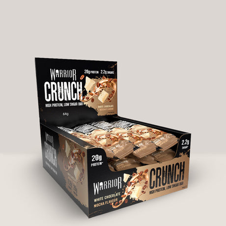Imagine cu batonul proteic Warrior Crunch Bar de la WARRIOR, 64g. White chocolate mocha aroma.
