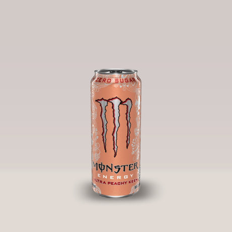 Doză de energizant fără zahăr Monster Energy Ultra Peachy Keen, cu aromă de piersică, 500ml.
