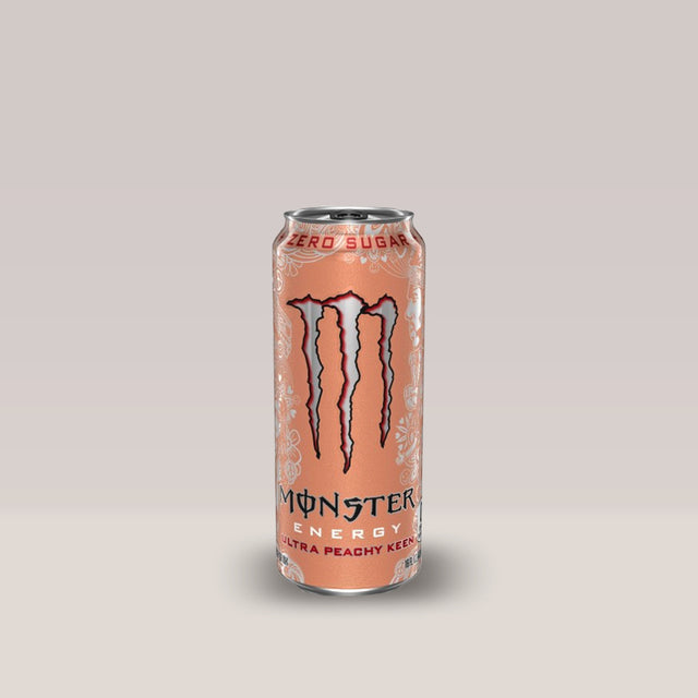 Doză de energizant fără zahăr Monster Energy Ultra Peachy Keen, cu aromă de piersică, 500ml.