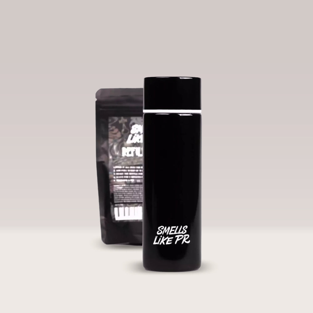 Kit cu săruri de amoniac reîncărcabile de la Smells Like PR, ce conține sticla metalică vacuum și pachetul de reumplere (refill).