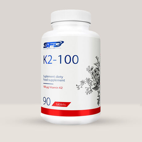 Imagine cu o cutie de SFD Vitamax K2 100 (90 tablete) de la SFD Nutrition, un supliment cu vitamina K2 pentru sănătatea oaselor.