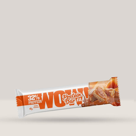 Imagine cu un abton proteic WOW! Protein Bar 45g de la Fitness Authority, o gustare delicioasă și sănătoasă cu aromă de caramel crispy.